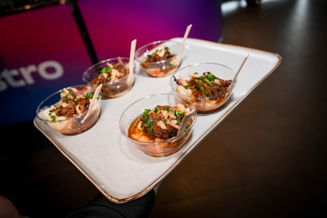 A platter of braised beef appetizers.