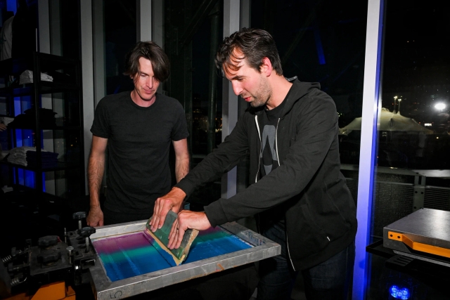 Fred K. Schott printing a t-shirt.